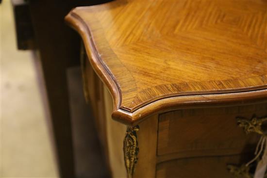 A pair of Louis XV style serpentine fronted two drawer kingwood chest, on slender cabriole legs, W.46cm